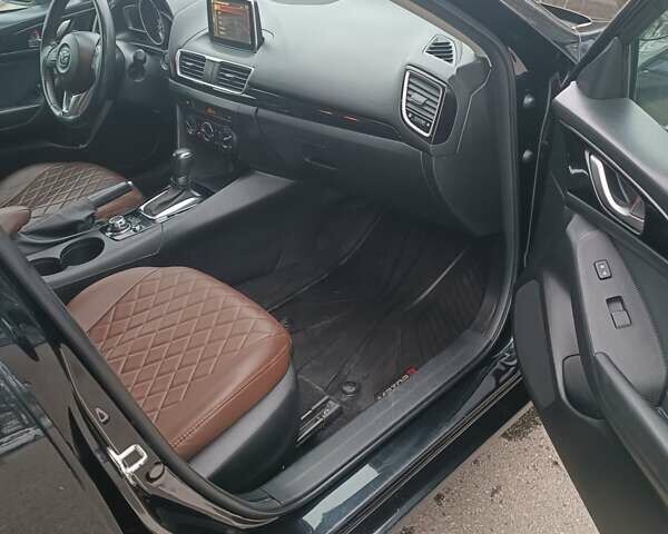 Черный Мазда 3, объемом двигателя 2 л и пробегом 128 тыс. км за 12700 $, фото 20 на Automoto.ua