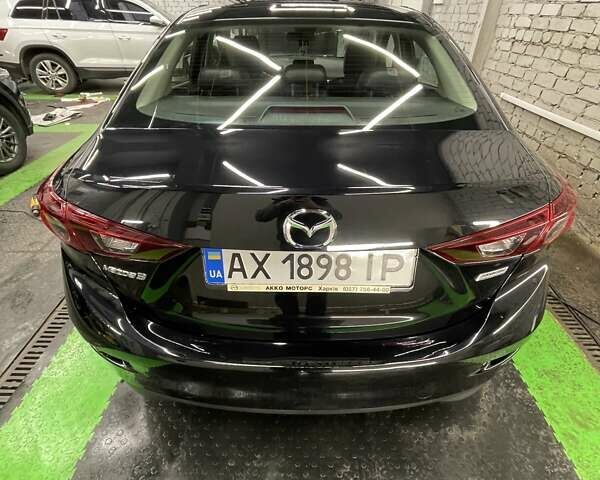 Чорний Мазда 3, об'ємом двигуна 2 л та пробігом 133 тис. км за 13999 $, фото 4 на Automoto.ua