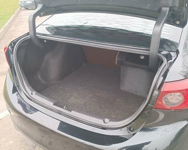 Черный Мазда 3, объемом двигателя 2 л и пробегом 128 тыс. км за 12700 $, фото 13 на Automoto.ua