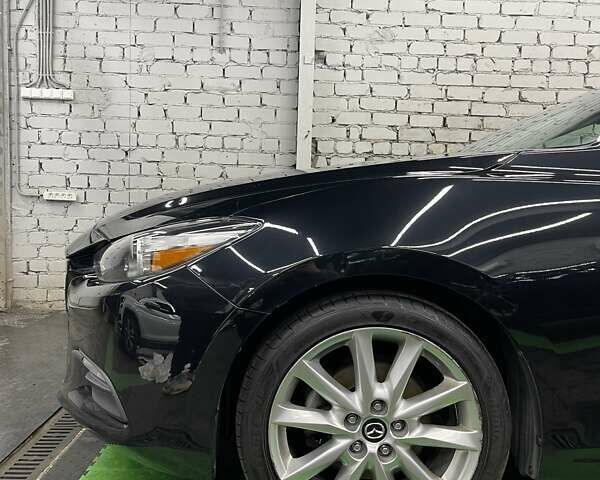Чорний Мазда 3, об'ємом двигуна 2 л та пробігом 133 тис. км за 13999 $, фото 5 на Automoto.ua