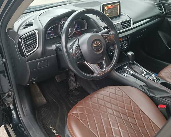 Черный Мазда 3, объемом двигателя 2 л и пробегом 128 тыс. км за 12700 $, фото 15 на Automoto.ua