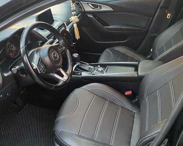 Чорний Мазда 3, об'ємом двигуна 2 л та пробігом 165 тис. км за 10500 $, фото 4 на Automoto.ua