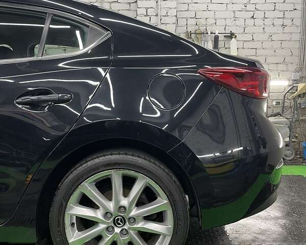 Чорний Мазда 3, об'ємом двигуна 2 л та пробігом 133 тис. км за 13999 $, фото 7 на Automoto.ua