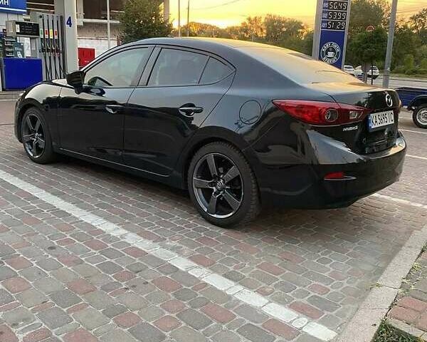 Чорний Мазда 3, об'ємом двигуна 2 л та пробігом 165 тис. км за 10500 $, фото 5 на Automoto.ua