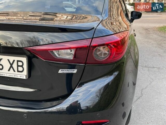 Черный Мазда 3, объемом двигателя 1.5 л и пробегом 116 тыс. км за 14500 $, фото 5 на Automoto.ua