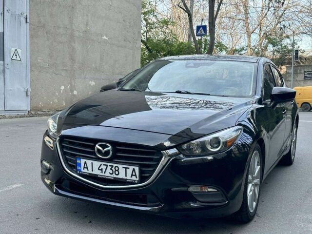 Черный Мазда 3, объемом двигателя 2 л и пробегом 190 тыс. км за 10300 $, фото 1 на Automoto.ua