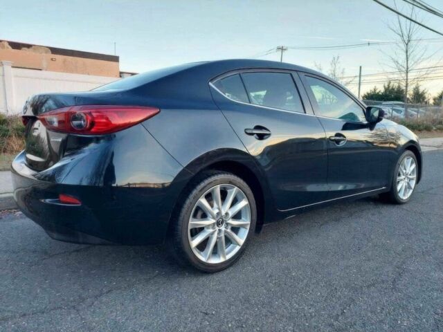 Черный Мазда 3, объемом двигателя 2 л и пробегом 70 тыс. км за 2000 $, фото 4 на Automoto.ua