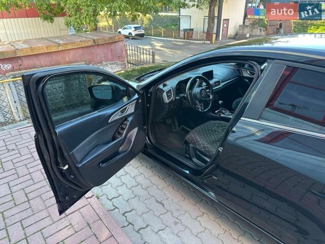 Чорний Мазда 3, об'ємом двигуна 2 л та пробігом 134 тис. км за 11800 $, фото 17 на Automoto.ua