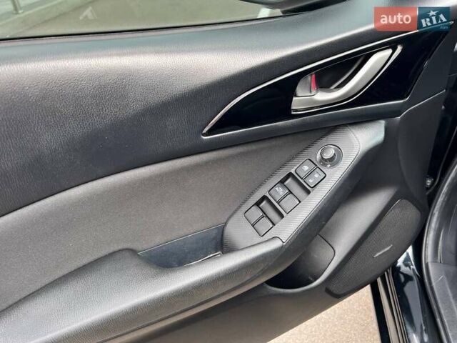 Черный Мазда 3, объемом двигателя 2 л и пробегом 195 тыс. км за 9490 $, фото 11 на Automoto.ua