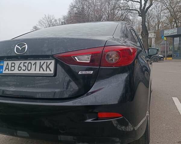 Черный Мазда 3, объемом двигателя 2 л и пробегом 128 тыс. км за 12700 $, фото 10 на Automoto.ua