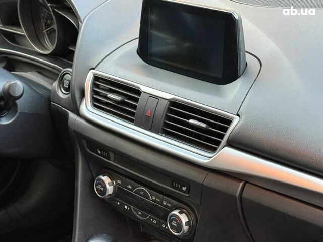 Чорний Мазда 3, об'ємом двигуна 2 л та пробігом 107 тис. км за 13290 $, фото 13 на Automoto.ua