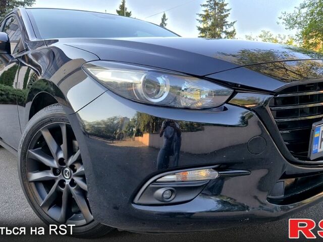 Черный Мазда 3, объемом двигателя 2.5 л и пробегом 140 тыс. км за 12100 $, фото 1 на Automoto.ua