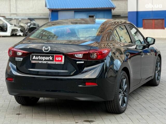 Чорний Мазда 3, об'ємом двигуна 2 л та пробігом 107 тис. км за 13290 $, фото 5 на Automoto.ua