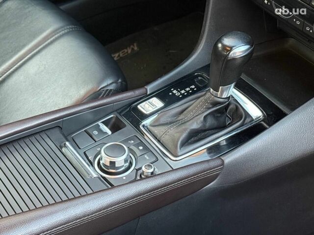 Чорний Мазда 3, об'ємом двигуна 2 л та пробігом 107 тис. км за 13290 $, фото 12 на Automoto.ua