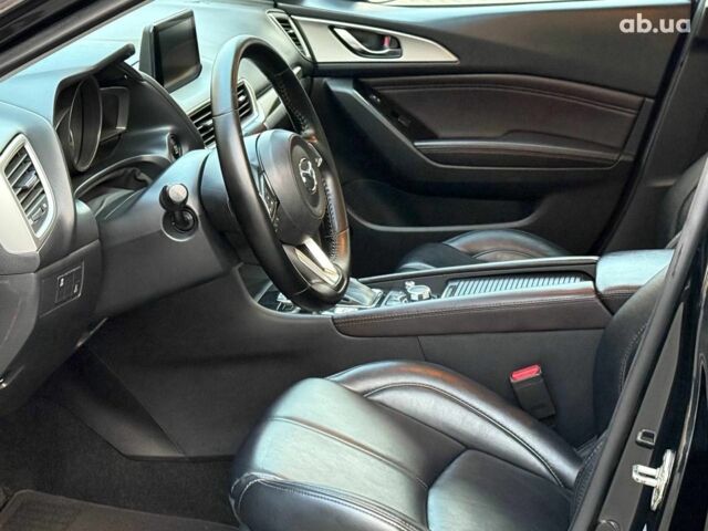 Чорний Мазда 3, об'ємом двигуна 2 л та пробігом 107 тис. км за 13290 $, фото 15 на Automoto.ua