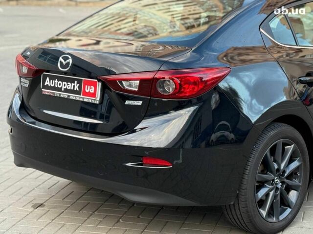 Чорний Мазда 3, об'ємом двигуна 2 л та пробігом 107 тис. км за 13290 $, фото 4 на Automoto.ua