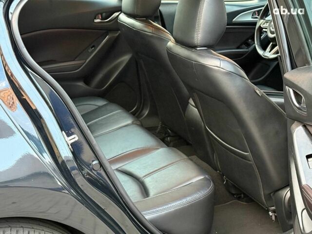 Чорний Мазда 3, об'ємом двигуна 2 л та пробігом 107 тис. км за 13290 $, фото 9 на Automoto.ua