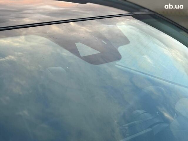 Чорний Мазда 3, об'ємом двигуна 2 л та пробігом 107 тис. км за 13290 $, фото 10 на Automoto.ua