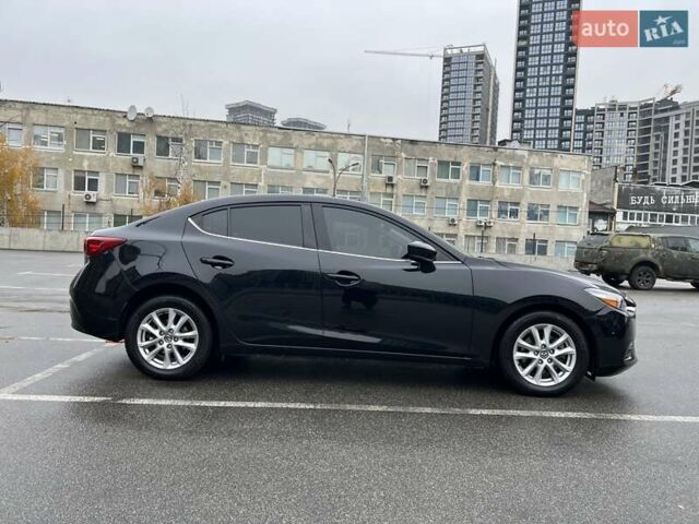 Черный Мазда 3, объемом двигателя 2 л и пробегом 122 тыс. км за 12000 $, фото 19 на Automoto.ua