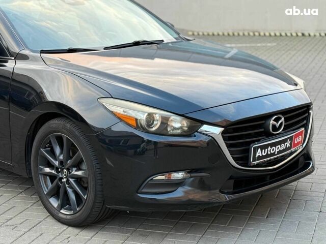 Чорний Мазда 3, об'ємом двигуна 2 л та пробігом 107 тис. км за 13290 $, фото 3 на Automoto.ua