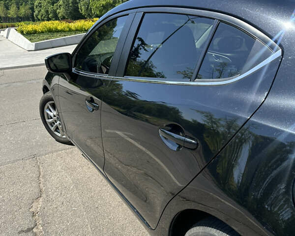 Чорний Мазда 3, об'ємом двигуна 2 л та пробігом 135 тис. км за 11200 $, фото 3 на Automoto.ua