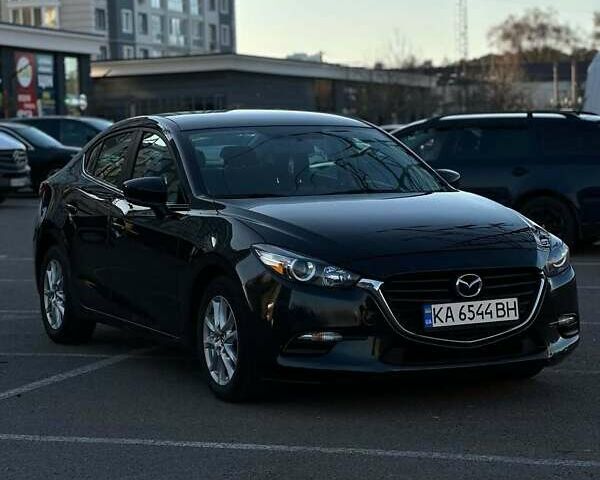 Чорний Мазда 3, об'ємом двигуна 2 л та пробігом 236 тис. км за 12800 $, фото 4 на Automoto.ua