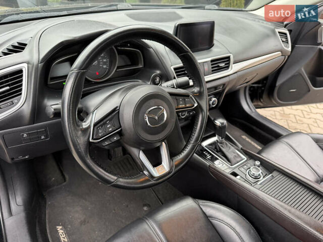 Черный Мазда 3, объемом двигателя 2.49 л и пробегом 130 тыс. км за 11500 $, фото 13 на Automoto.ua