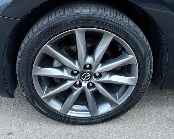 Черный Мазда 3, объемом двигателя 2.49 л и пробегом 92 тыс. км за 12900 $, фото 1 на Automoto.ua