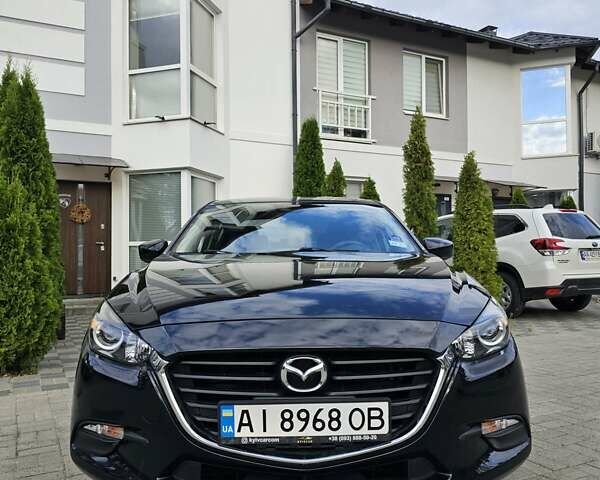 Черный Мазда 3, объемом двигателя 2 л и пробегом 75 тыс. км за 13500 $, фото 1 на Automoto.ua