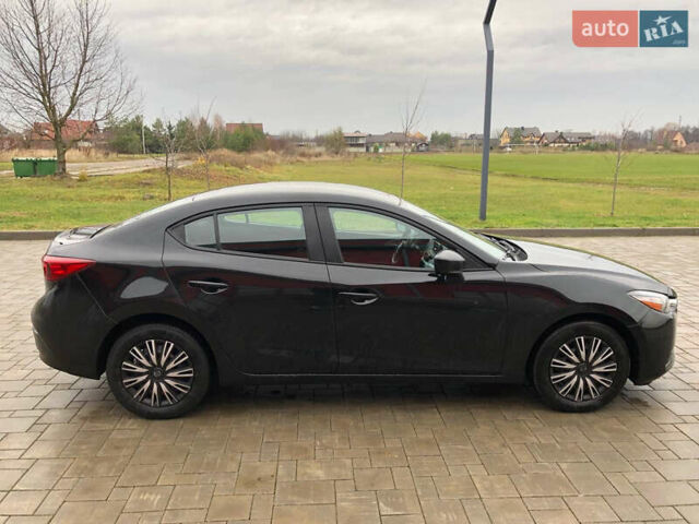 Черный Мазда 3, объемом двигателя 2 л и пробегом 163 тыс. км за 9800 $, фото 6 на Automoto.ua