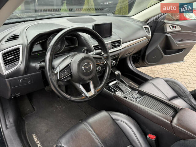 Черный Мазда 3, объемом двигателя 2.49 л и пробегом 130 тыс. км за 11500 $, фото 12 на Automoto.ua