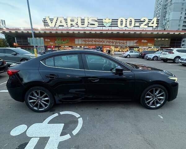 Черный Мазда 3, объемом двигателя 2.49 л и пробегом 92 тыс. км за 12900 $, фото 4 на Automoto.ua