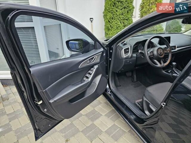 Черный Мазда 3, объемом двигателя 2 л и пробегом 75 тыс. км за 13500 $, фото 9 на Automoto.ua