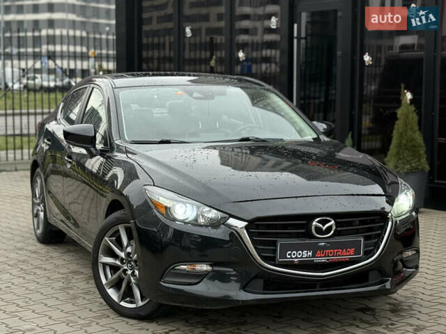 Черный Мазда 3, объемом двигателя 2.49 л и пробегом 130 тыс. км за 11500 $, фото 2 на Automoto.ua