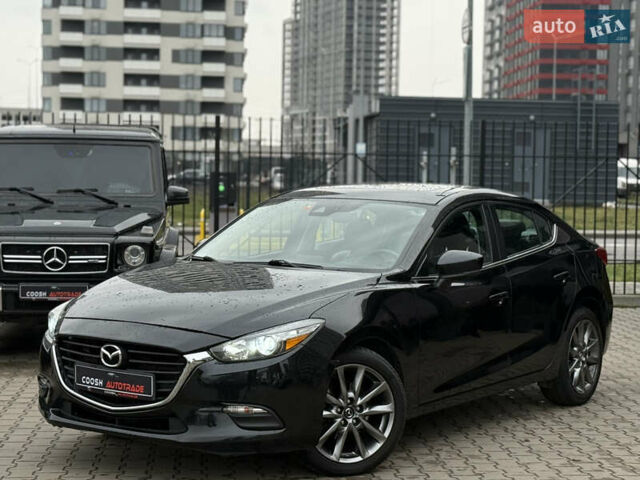 Черный Мазда 3, объемом двигателя 2.49 л и пробегом 130 тыс. км за 11500 $, фото 1 на Automoto.ua