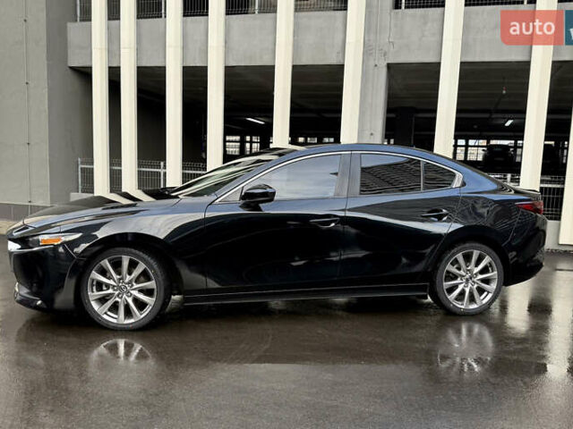 Черный Мазда 3, объемом двигателя 2.49 л и пробегом 65 тыс. км за 16550 $, фото 3 на Automoto.ua