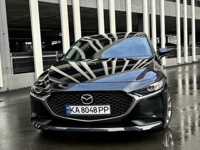 Черный Мазда 3, объемом двигателя 2.49 л и пробегом 65 тыс. км за 16550 $, фото 1 на Automoto.ua