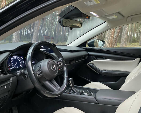Черный Мазда 3, объемом двигателя 2.49 л и пробегом 100 тыс. км за 17000 $, фото 10 на Automoto.ua