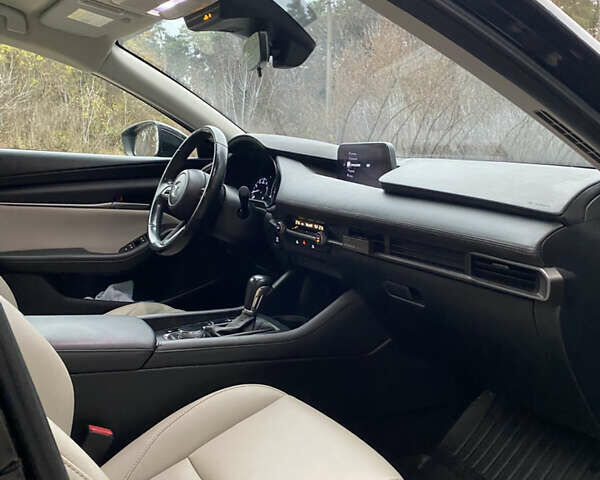 Черный Мазда 3, объемом двигателя 2.49 л и пробегом 100 тыс. км за 17000 $, фото 11 на Automoto.ua