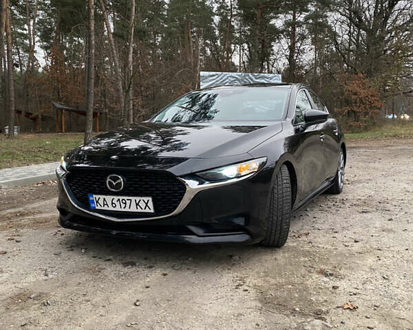 Черный Мазда 3, объемом двигателя 2.49 л и пробегом 100 тыс. км за 17000 $, фото 1 на Automoto.ua
