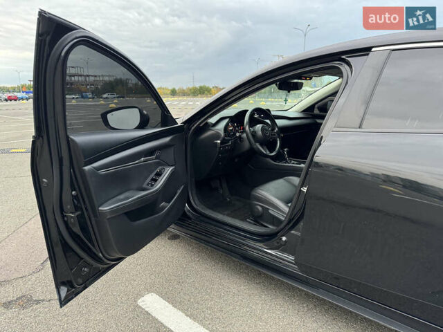 Черный Мазда 3, объемом двигателя 2.49 л и пробегом 114 тыс. км за 18500 $, фото 3 на Automoto.ua