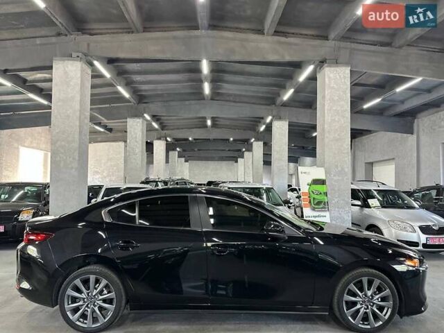 Черный Мазда 3, объемом двигателя 2.49 л и пробегом 129 тыс. км за 15299 $, фото 7 на Automoto.ua
