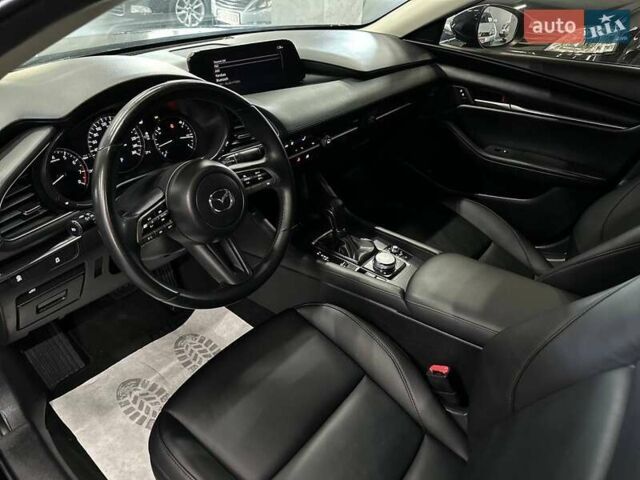 Черный Мазда 3, объемом двигателя 2.49 л и пробегом 129 тыс. км за 15299 $, фото 11 на Automoto.ua