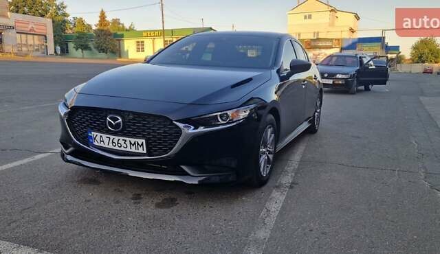 Черный Мазда 3, объемом двигателя 2.49 л и пробегом 40 тыс. км за 17500 $, фото 2 на Automoto.ua