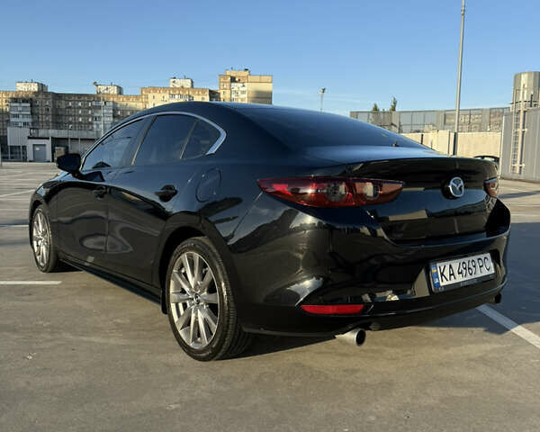 Черный Мазда 3, объемом двигателя 2.49 л и пробегом 58 тыс. км за 14500 $, фото 3 на Automoto.ua