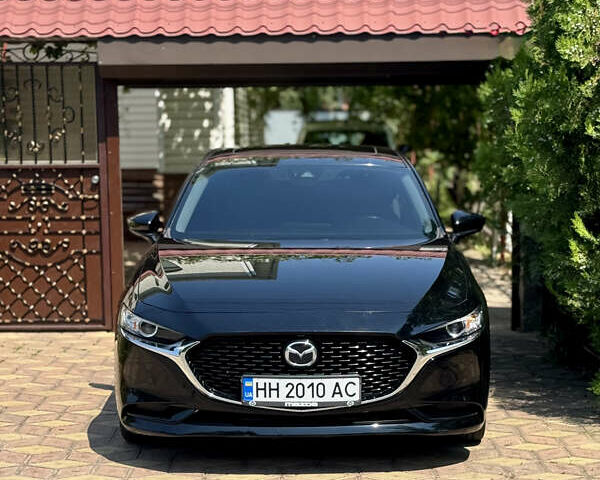 Черный Мазда 3, объемом двигателя 2.49 л и пробегом 47 тыс. км за 15700 $, фото 1 на Automoto.ua