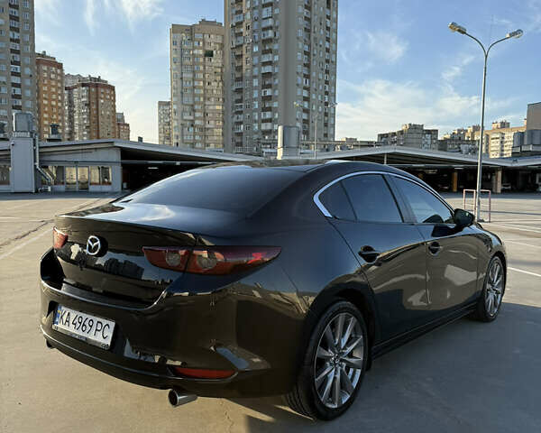 Черный Мазда 3, объемом двигателя 2.49 л и пробегом 58 тыс. км за 14500 $, фото 4 на Automoto.ua