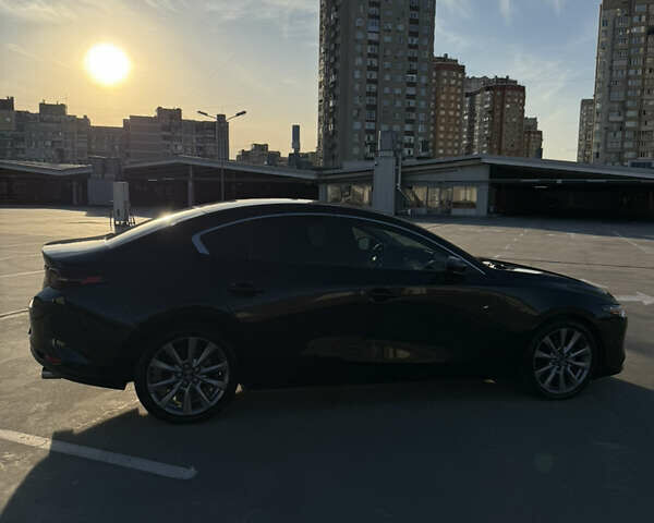 Черный Мазда 3, объемом двигателя 2.49 л и пробегом 57 тыс. км за 16200 $, фото 8 на Automoto.ua