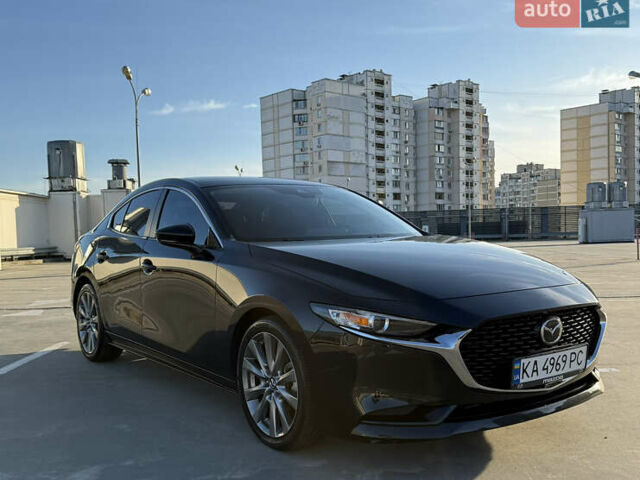 Черный Мазда 3, объемом двигателя 2.49 л и пробегом 58 тыс. км за 14500 $, фото 1 на Automoto.ua