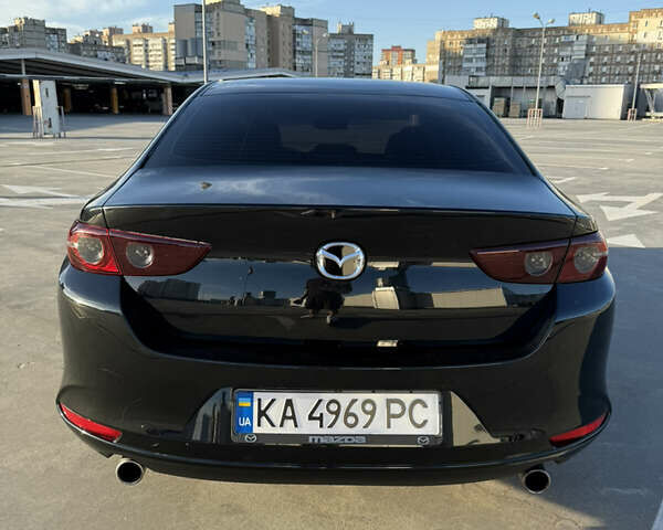 Черный Мазда 3, объемом двигателя 2.49 л и пробегом 57 тыс. км за 16200 $, фото 6 на Automoto.ua